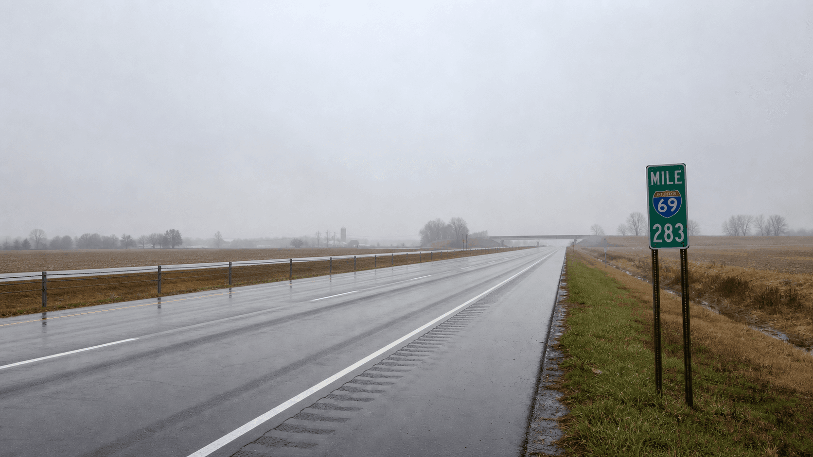 Foggy early-morning view of southbound Interstate 69 near Markle in Huntington County, Indiana, where a chain-reaction crash injured two people on June 20, 2026.