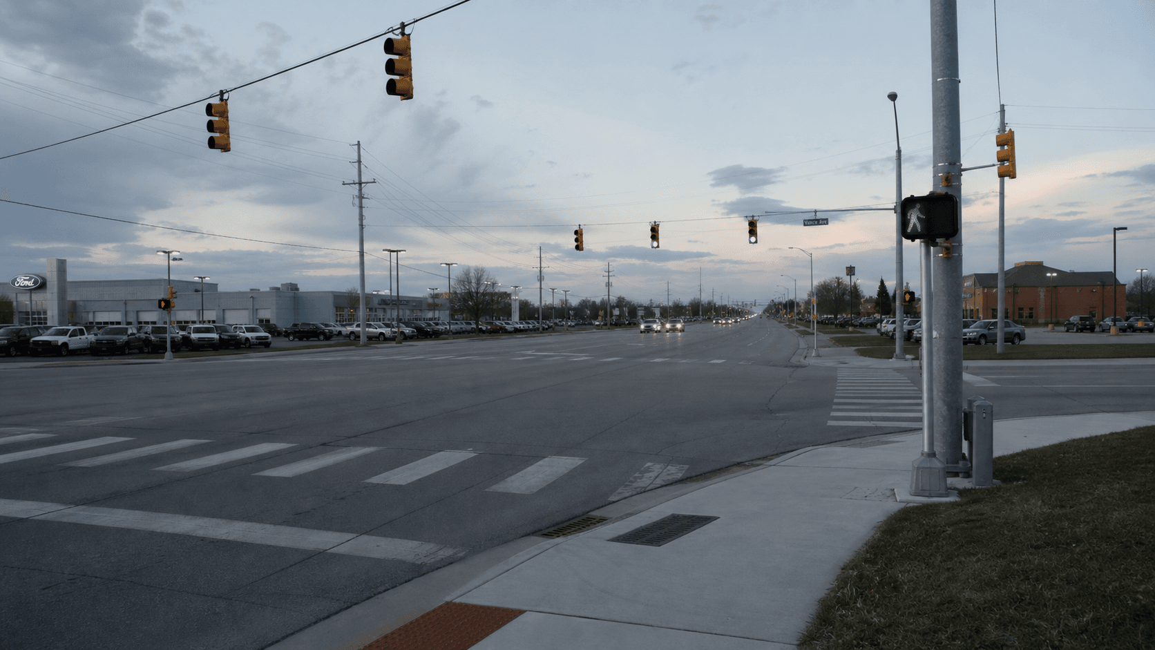 Early-morning view of Coliseum Boulevard and Vance Avenue in Fort Wayne, where a pedestrian was critically injured in a collision involving a school bus.