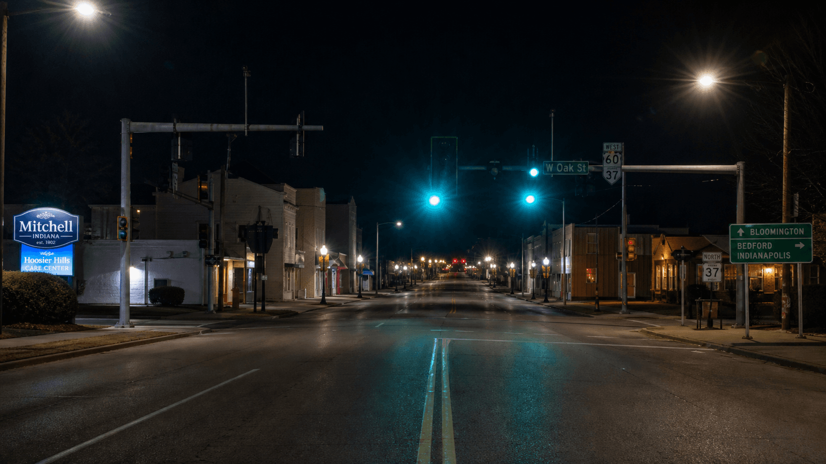 State Road 60 and a town street intersection in Mitchell, Lawrence County, representing the location of a reported multi-vehicle injury crash.