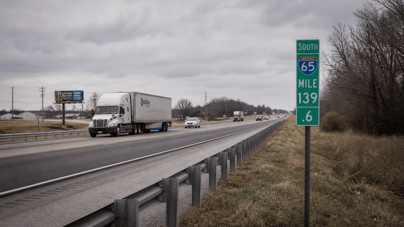 Interstate 65 roadway and guardrail near Lebanon in Boone County, the location context for a reported two-vehicle crash and OWI arrest.