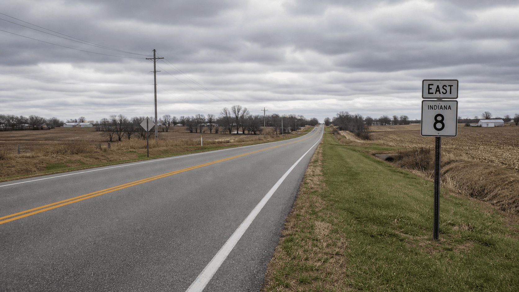 State Road 8 in a rural area near Butler, DeKalb County, where a single-vehicle rollover was reported.