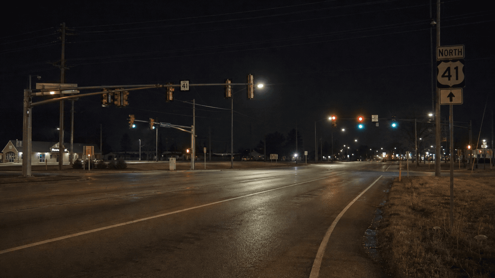U.S. 41 near a connecting road in Vigo County at night, providing context for a reported motorcycle crash near Harlan Drive.