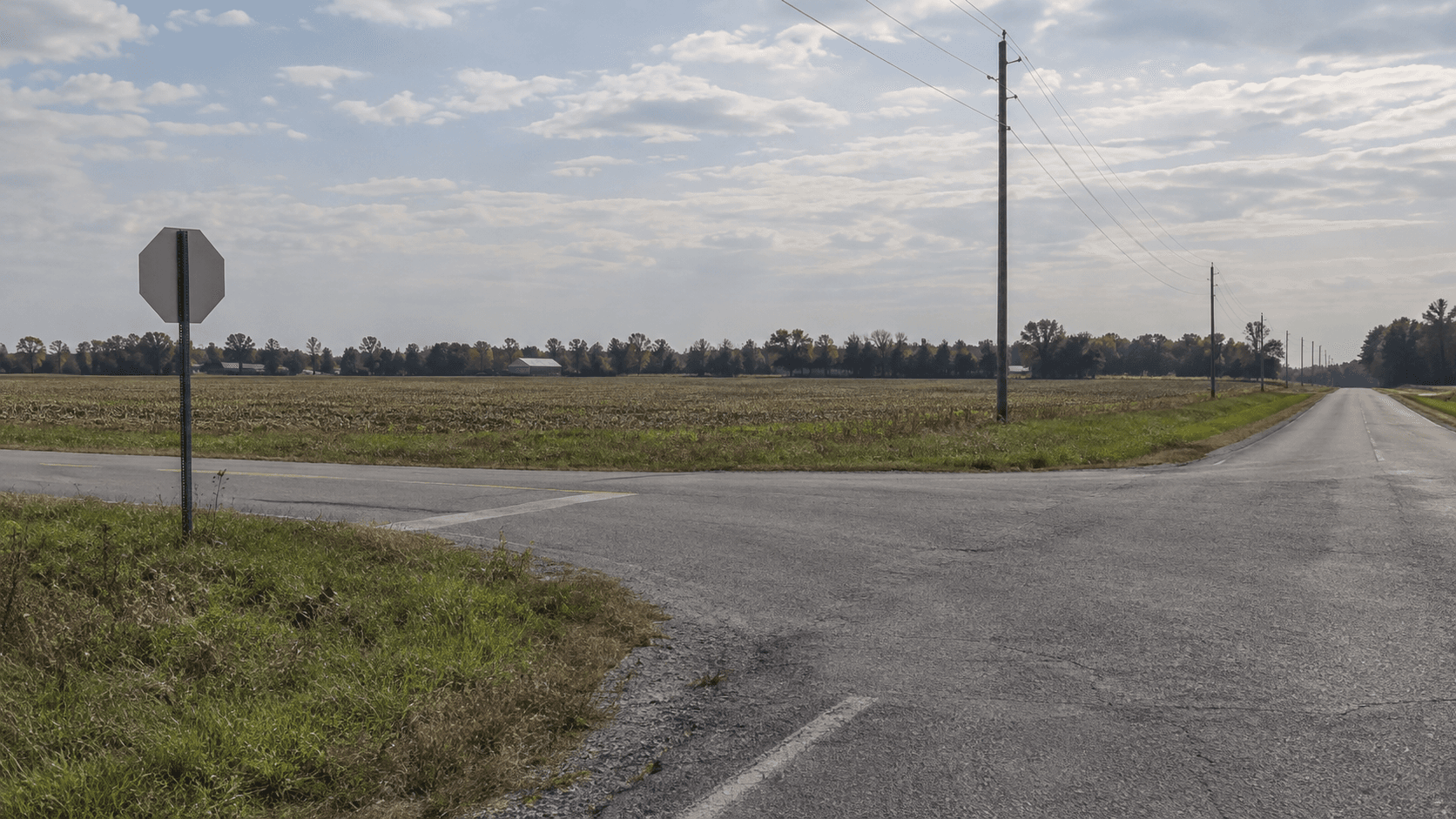 Rural county-road intersection in DeKalb County, Indiana, representing the motorcycle crash reported at County Road 60 and County Road 45.