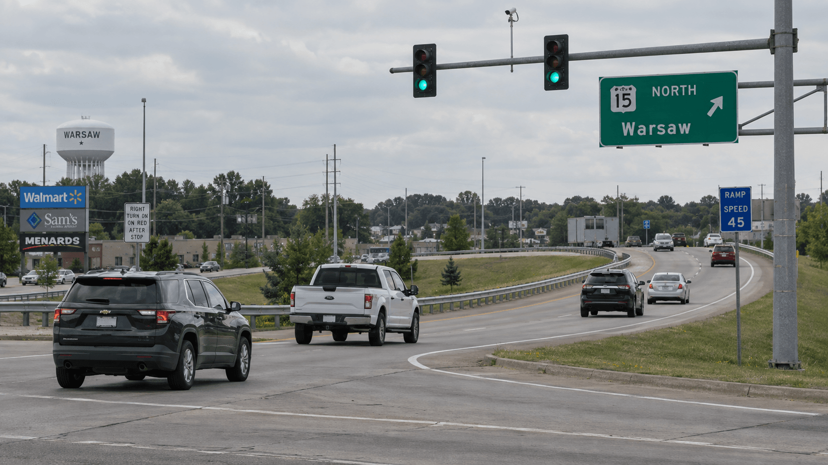 State Road 15 interchange ramp and traffic signal in Warsaw, Kosciusko County, where a red-light crash injured a passenger.