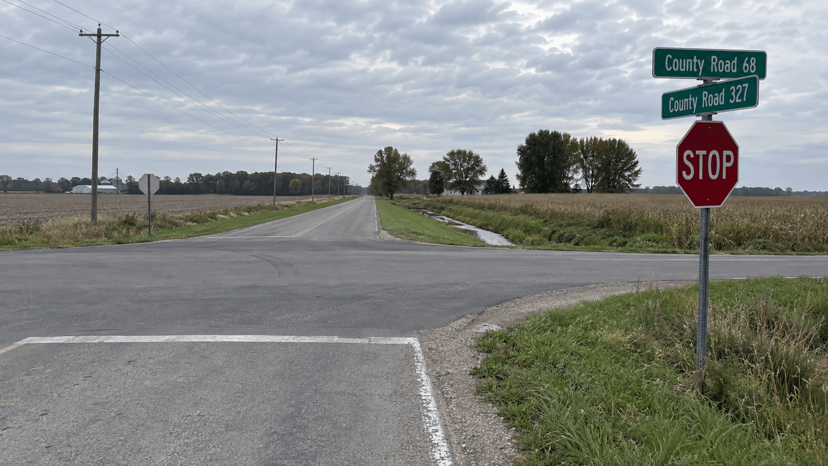 Rural stop controlled intersection at County Road 68 and County Road 327 near Garrett in DeKalb County, where a two vehicle crash injured two people.