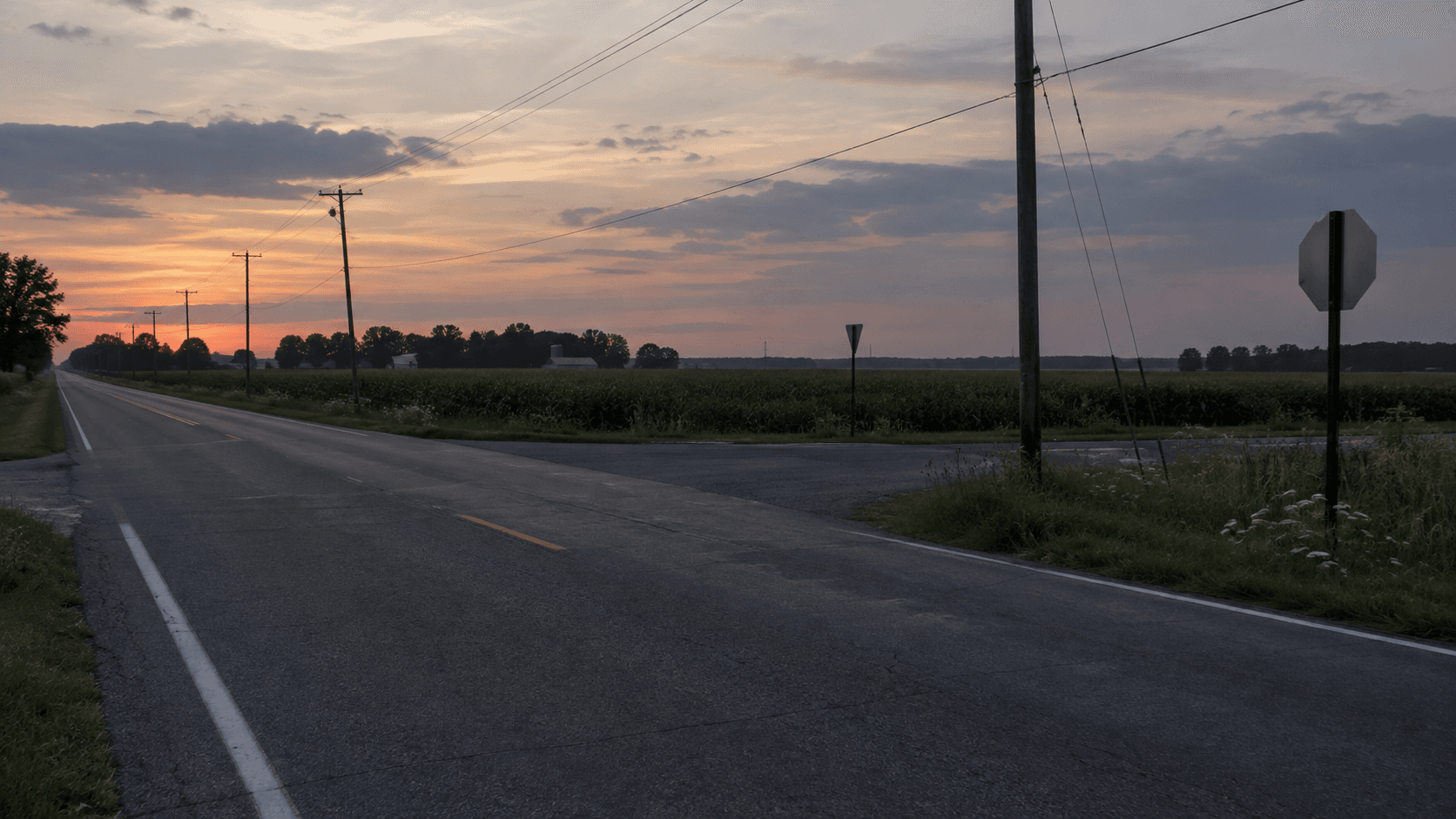 County Road 20 in Elkhart County near dusk, illustrating the setting of a reported dirt bike and car collision.