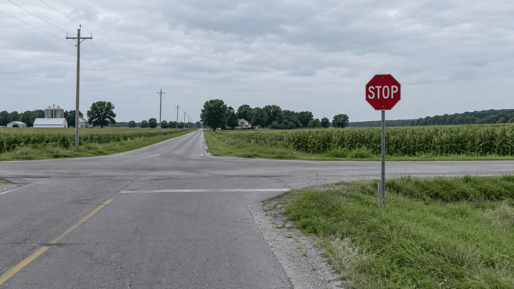 Rural county road intersection outside Goshen in Elkhart County, representing the setting of the County Road 11 and County Road 30 crash.