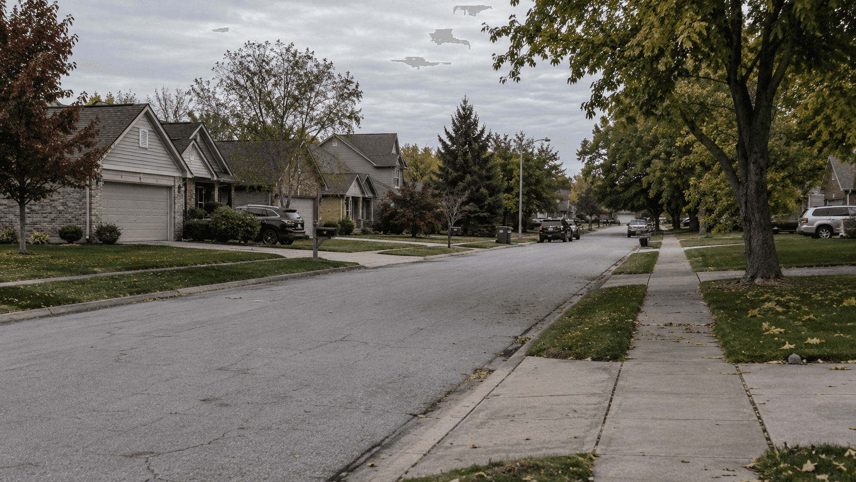 Residential street in Indianapolis, Marion County, representing the ongoing investigation into the fatal shooting reported on Jenison Drive.