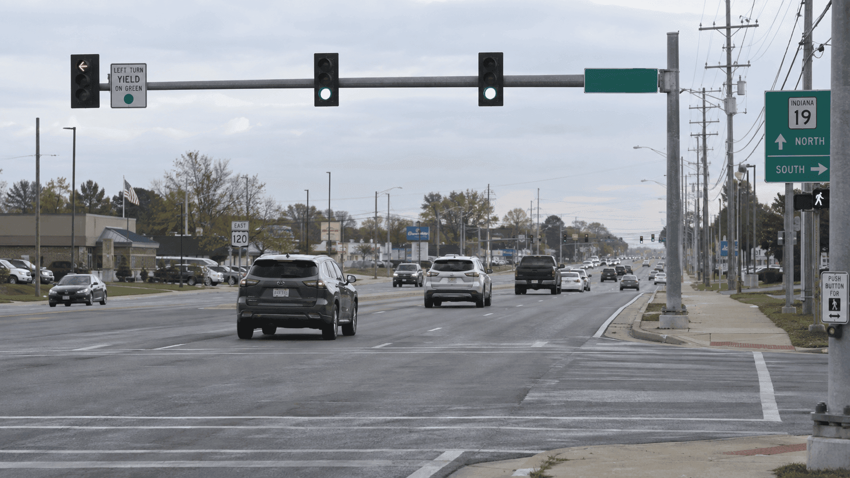 Highway intersection in Elkhart representing the reported failure-to-yield crash at U.S. 20 and Jefferson Parkway.