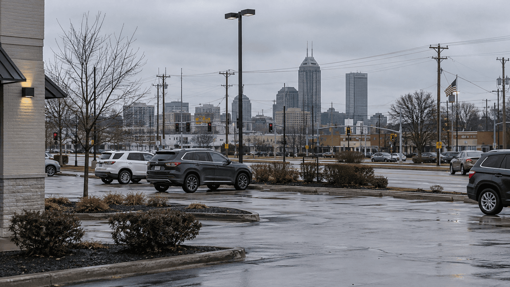Parking lot near an urban Indianapolis intersection, providing context for the fatal shooting reported near East 21st Street and Ritter Avenue.