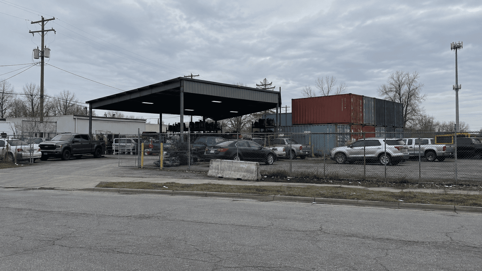 Auto parts yard setting on Stanley Avenue in Indianapolis, where a worker was seriously injured in a workplace fire.