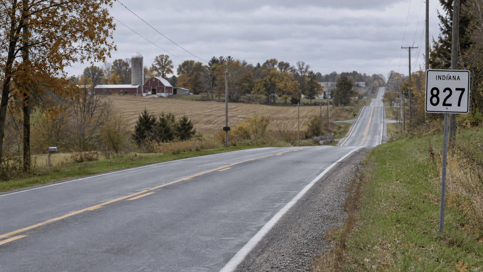 State Road 827 near Angola in Steuben County, where two motorcycle riders were seriously injured after striking cargo that fell from a pickup.
