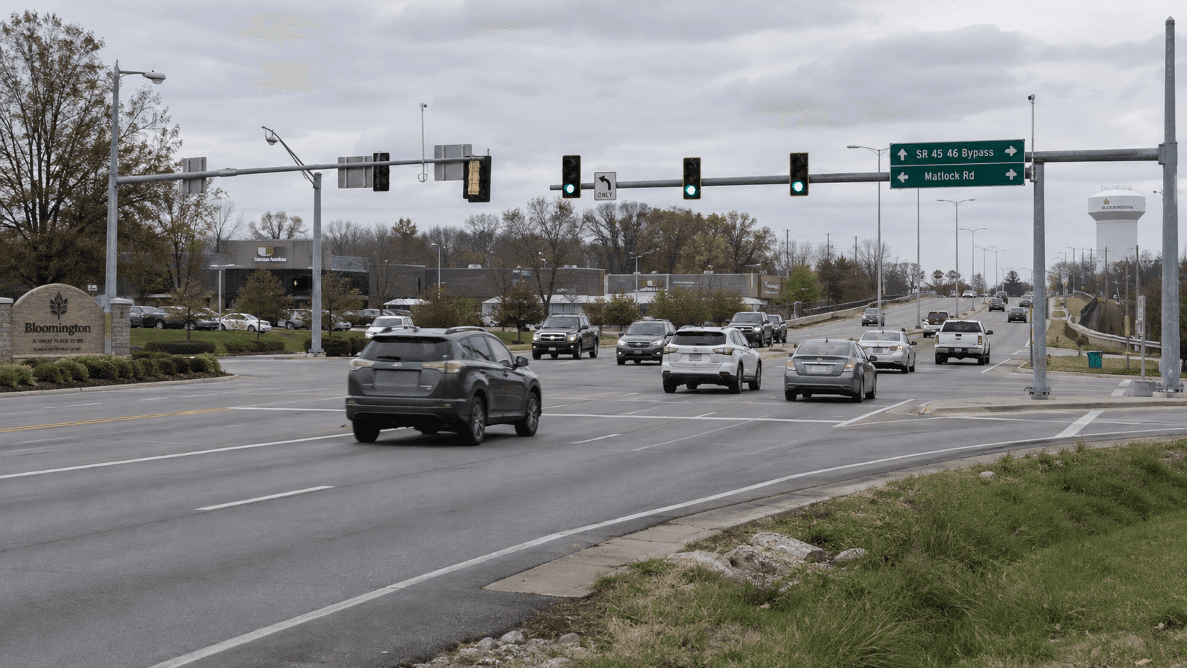 Wide view of an Indiana roadway intersection representing the 45/46 Bypass and Matlock Road area in Bloomington, where a fatal motorcycle crash is under investigation.
