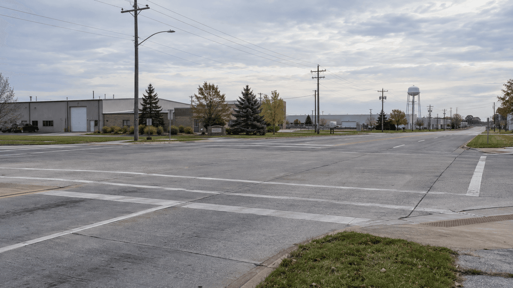 Industrial-area intersection in Warsaw, Kosciusko County, illustrating the setting of the South Zimmer Road and White Industrial Drive single-vehicle crash.