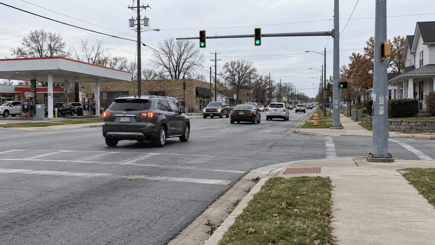 Street-level view near Morris Street and Belmont Avenue in Indianapolis, where a police pursuit reportedly ended in a crash that seriously injured two people.