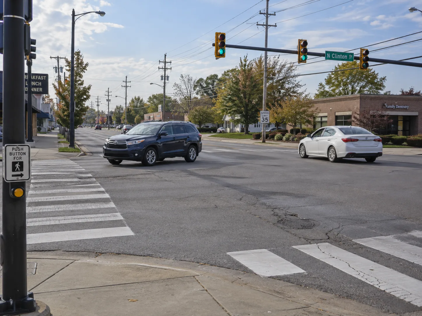 Illustration: Vehicles approaching a signalized intersection in Fort Wayne