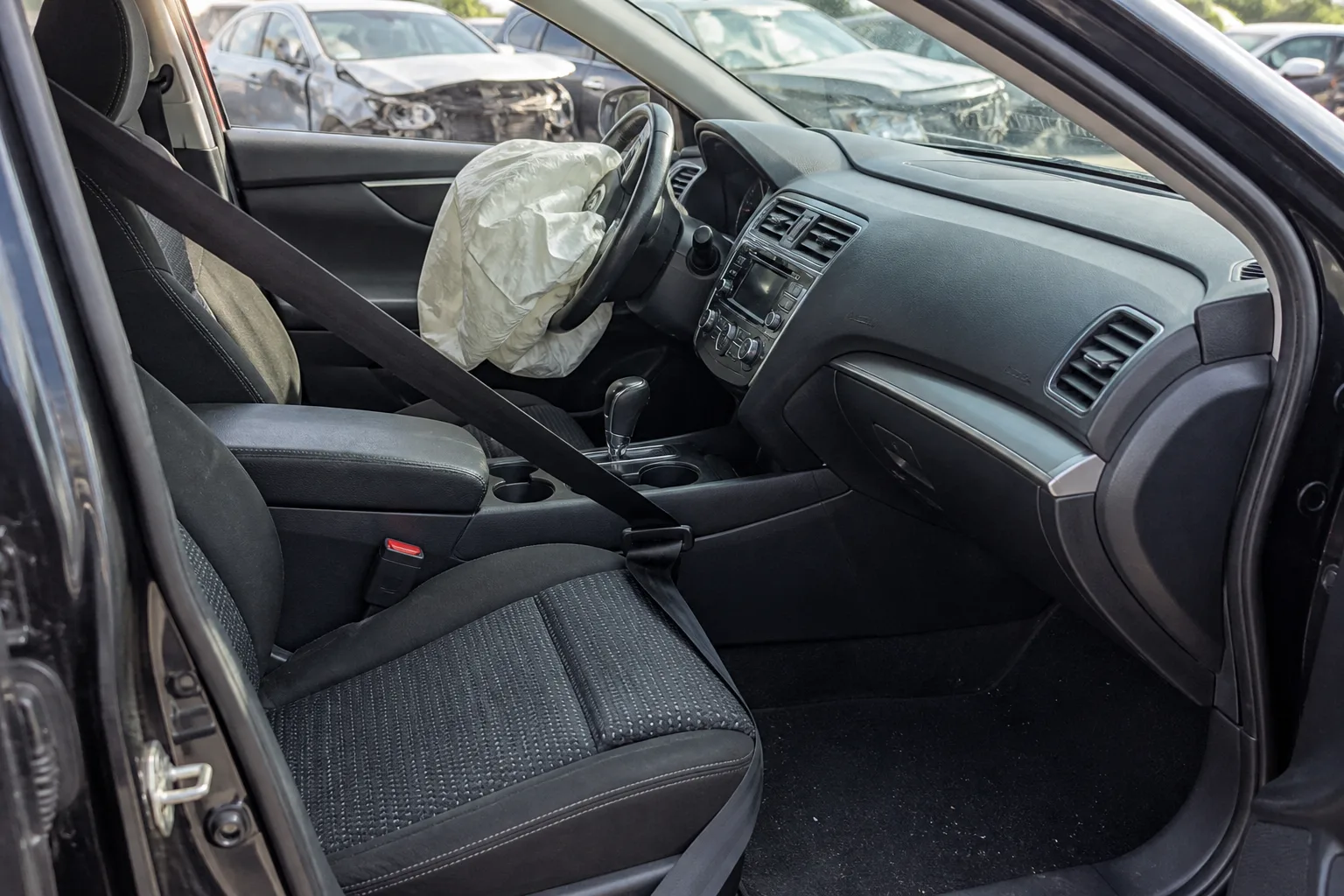 Deployed airbag and seat belt components preserved after an Indiana collision