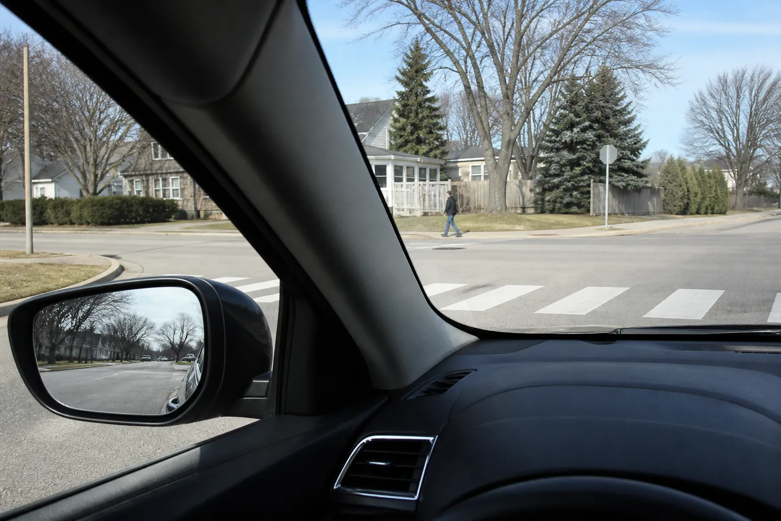 Left-turn lane and marked pedestrian crosswalk at a Fort Wayne intersection