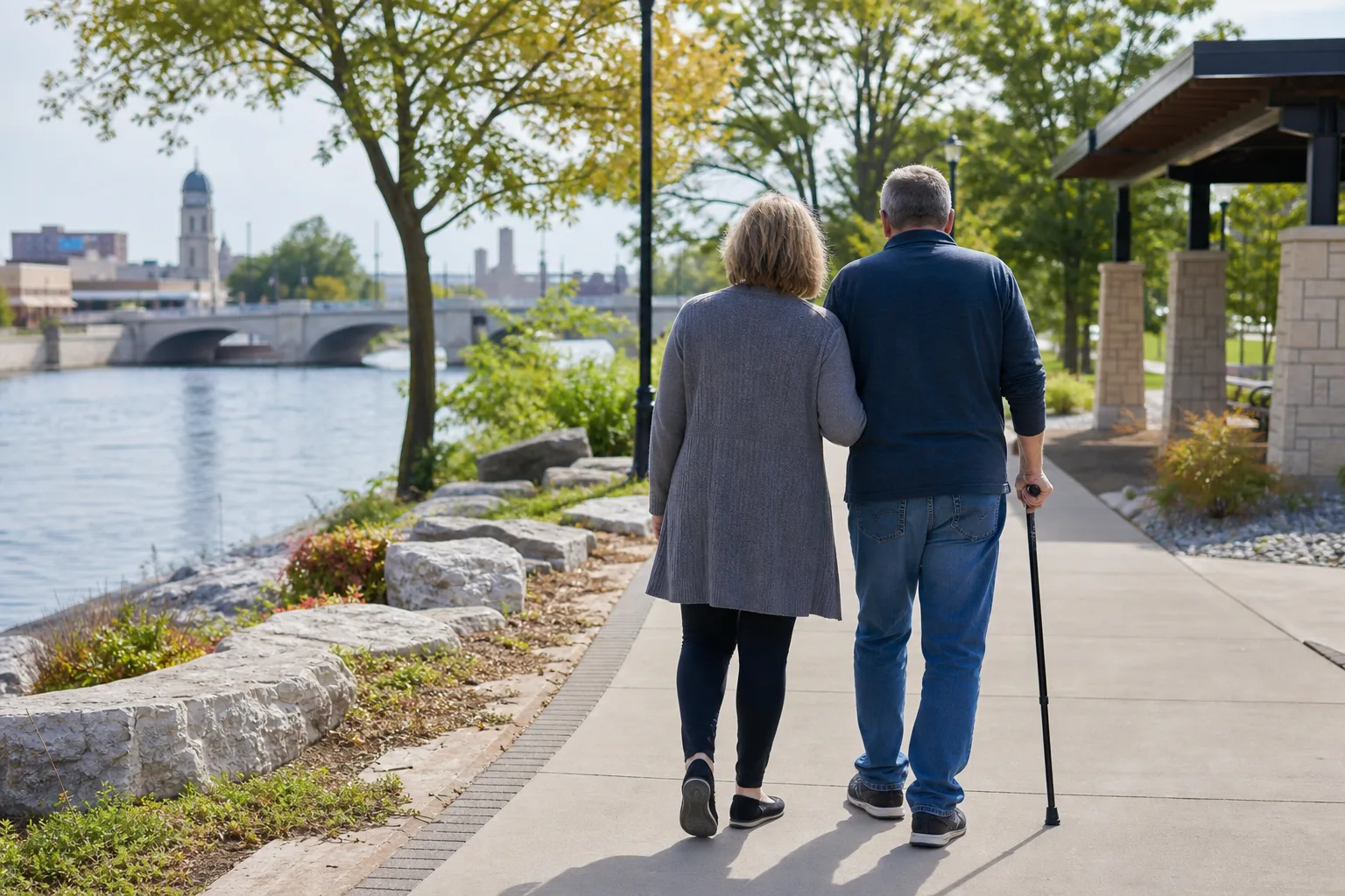 Married couple walking together during injury recovery at Promenade Park in Fort Wayne