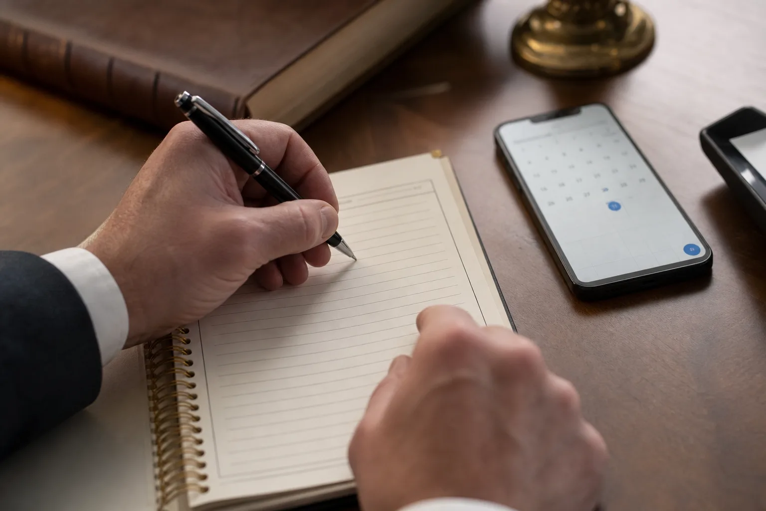Injured person taking notes and tracking symptoms and deadlines after an accident