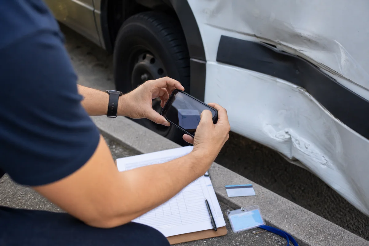 Evidence from an unbranded company vehicle documented after a Fort Wayne collision