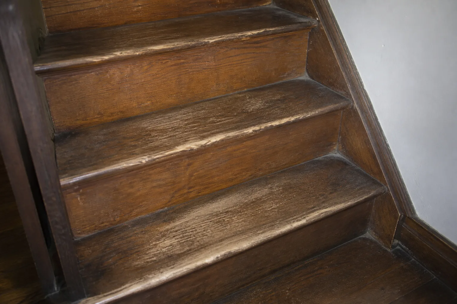 Worn stair treads inside an older Indiana rental building