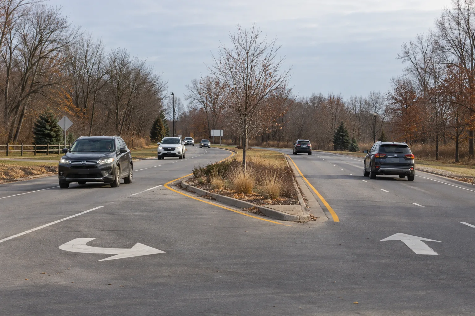 Directional pavement arrows at an Indiana divided-road entrance