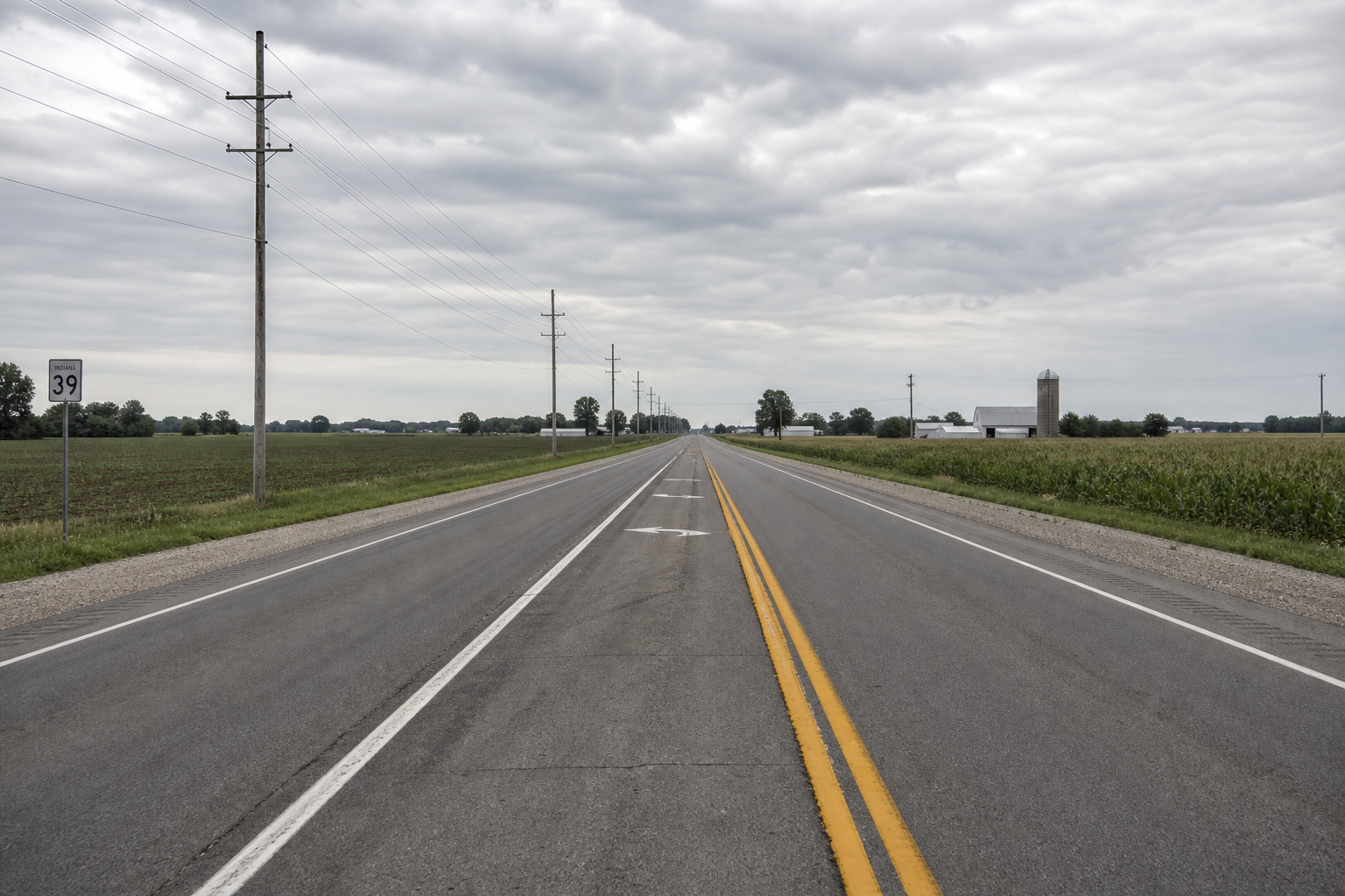 A north-south arterial road resembling Tonkel Road in Allen County, Indiana, illustrating the type of suburban roadway where the fatal crash occurred