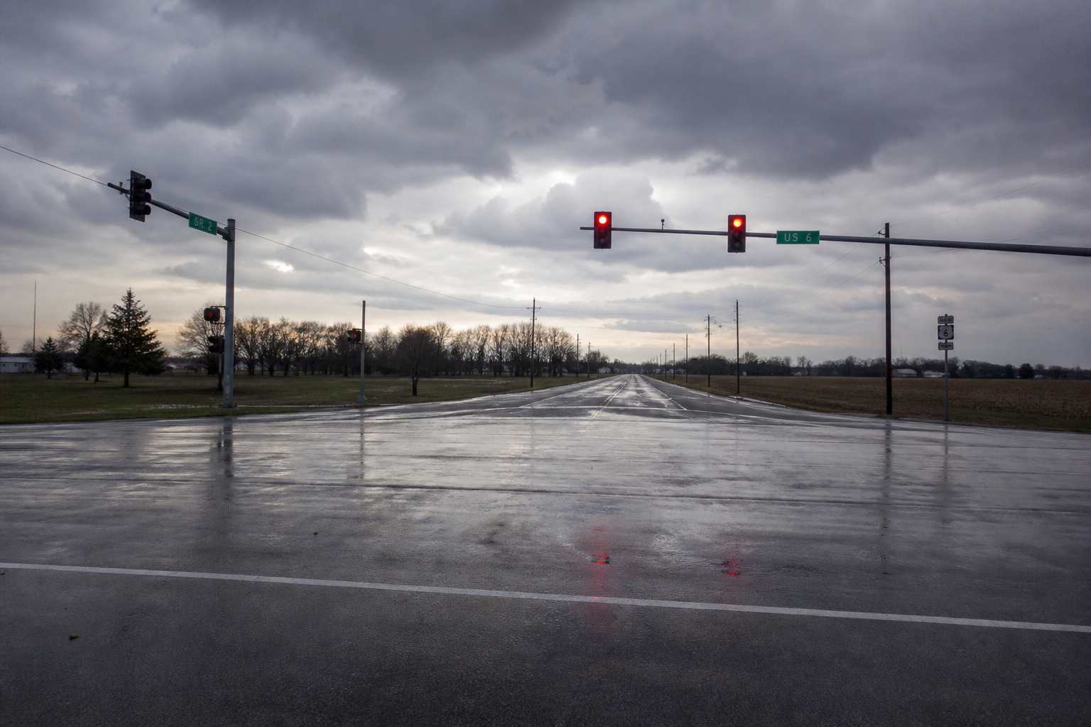 Rural highway intersection near Westville in LaPorte County after severe weather, illustrating the reported non-operating traffic signal.