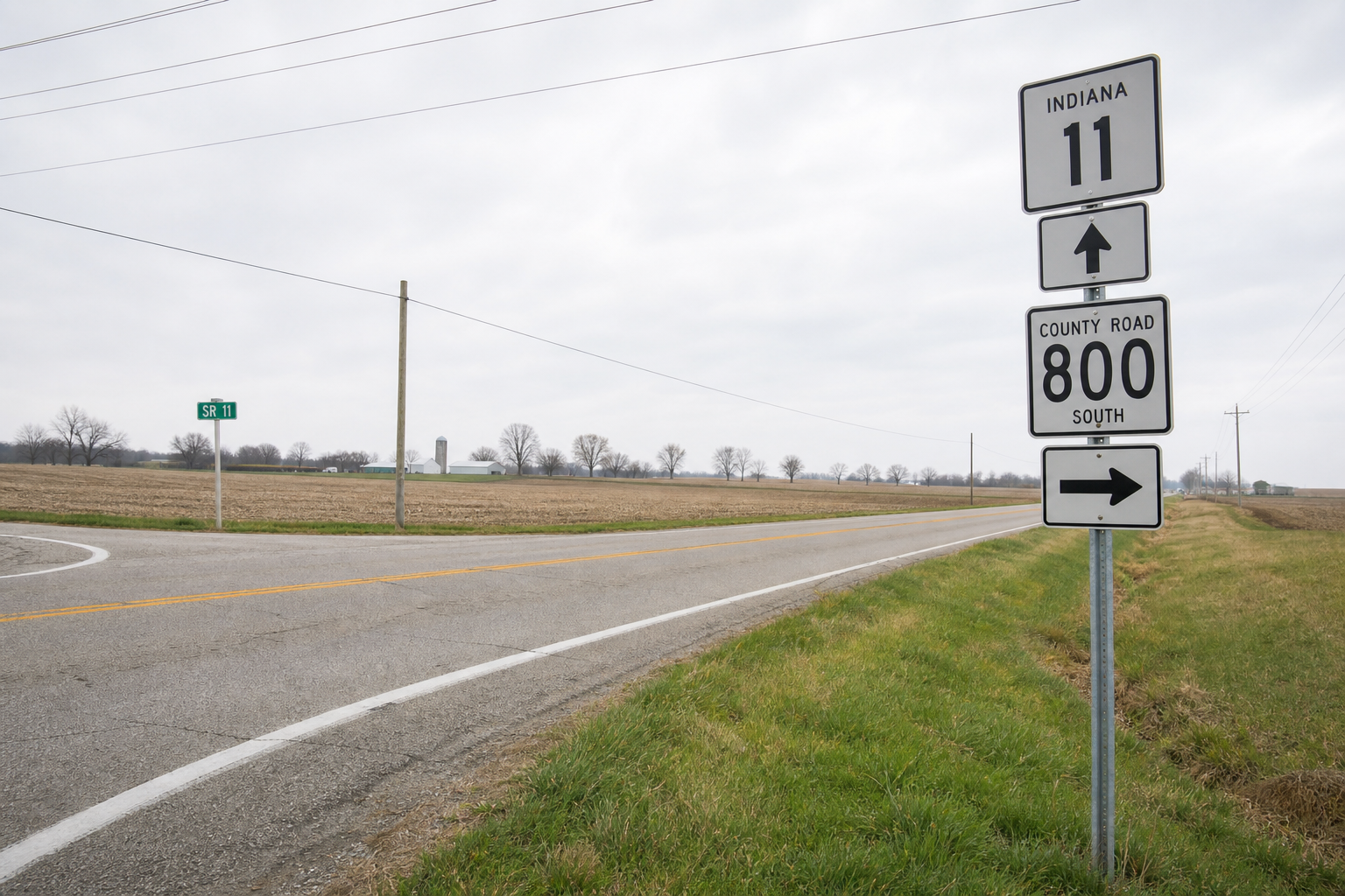 Road signs and rural highway scenery near State Road 11 and County Road 800 South in Bartholomew County.
