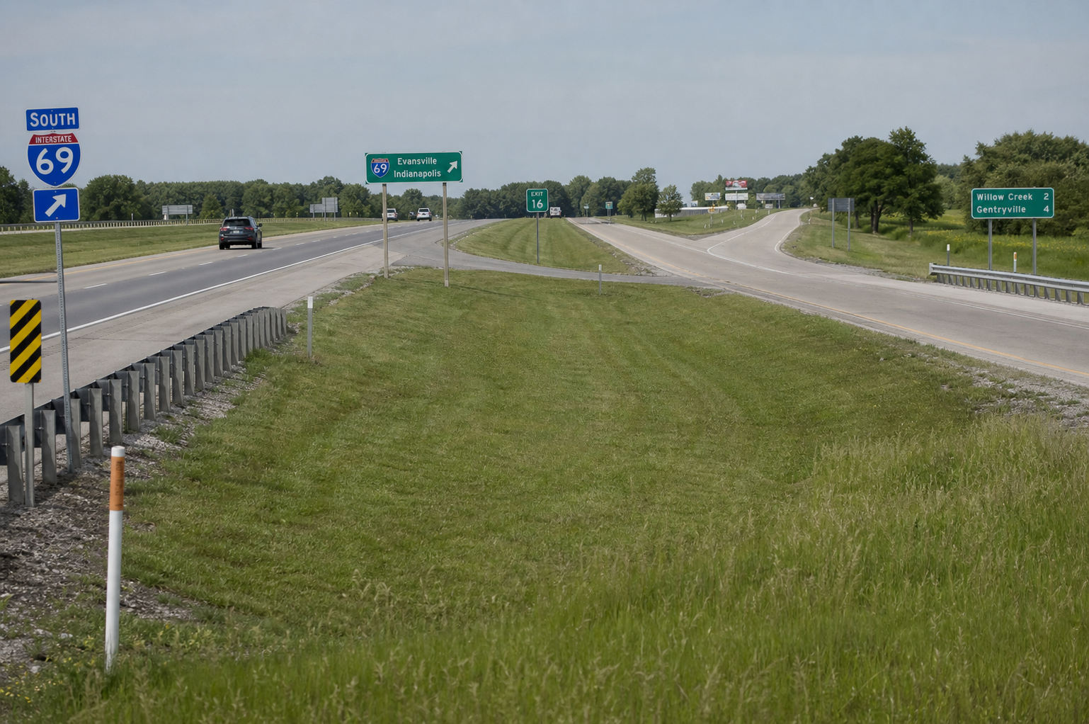 Indiana interstate shoulder and median crossover illustrating the type of roadway setting described in the Jeffersonville school bus crash reports.