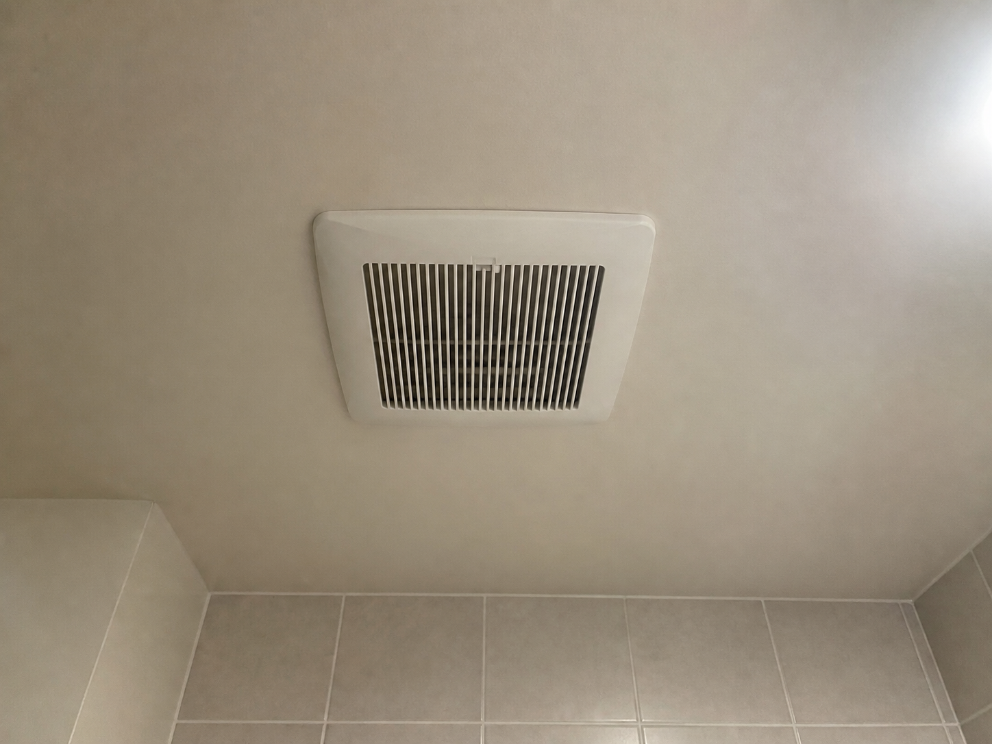 Bathroom exhaust fan representing the fixture investigators attributed as the cause of the South Bend apartment fire.