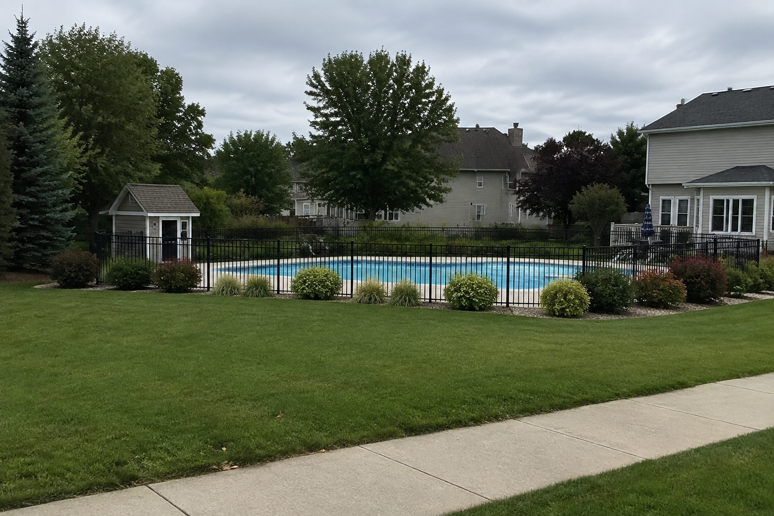 A generic private residential swimming pool setting representing the type of Daviess County location involved in the reported death.