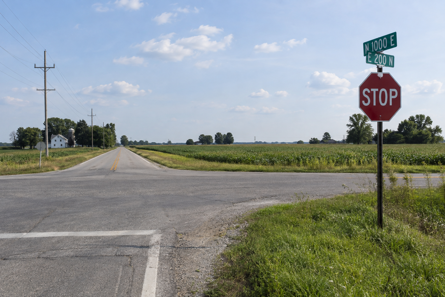 Roadway approaches at a rural DeKalb County intersection, illustrating the setting of the County Road 60 motorcycle crash.