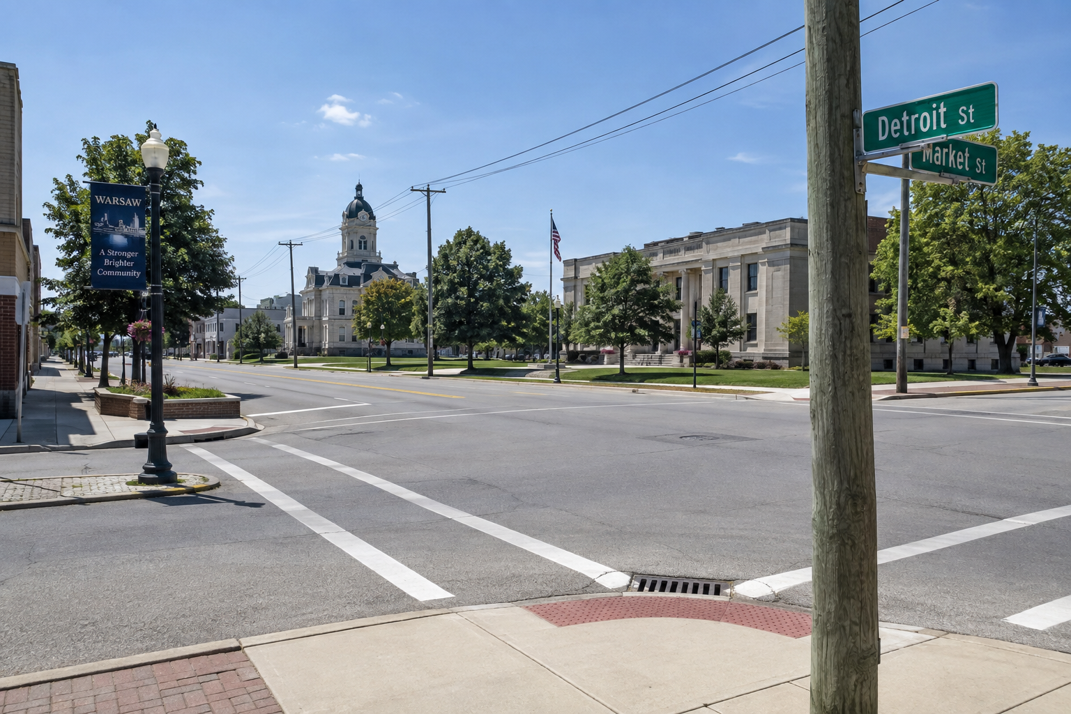 Warsaw intersection streetscape illustrating the roadway and fixed objects relevant to the West Winona Avenue crash.
