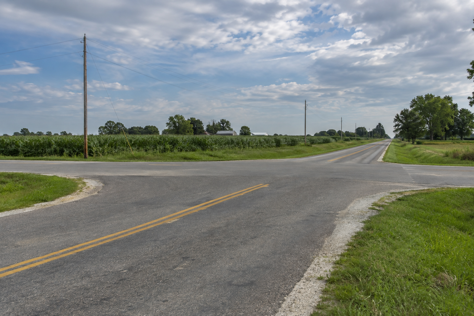 Roadway and shoulder near Culver in Marshall County, relevant to documenting the location of a single-vehicle rollover.