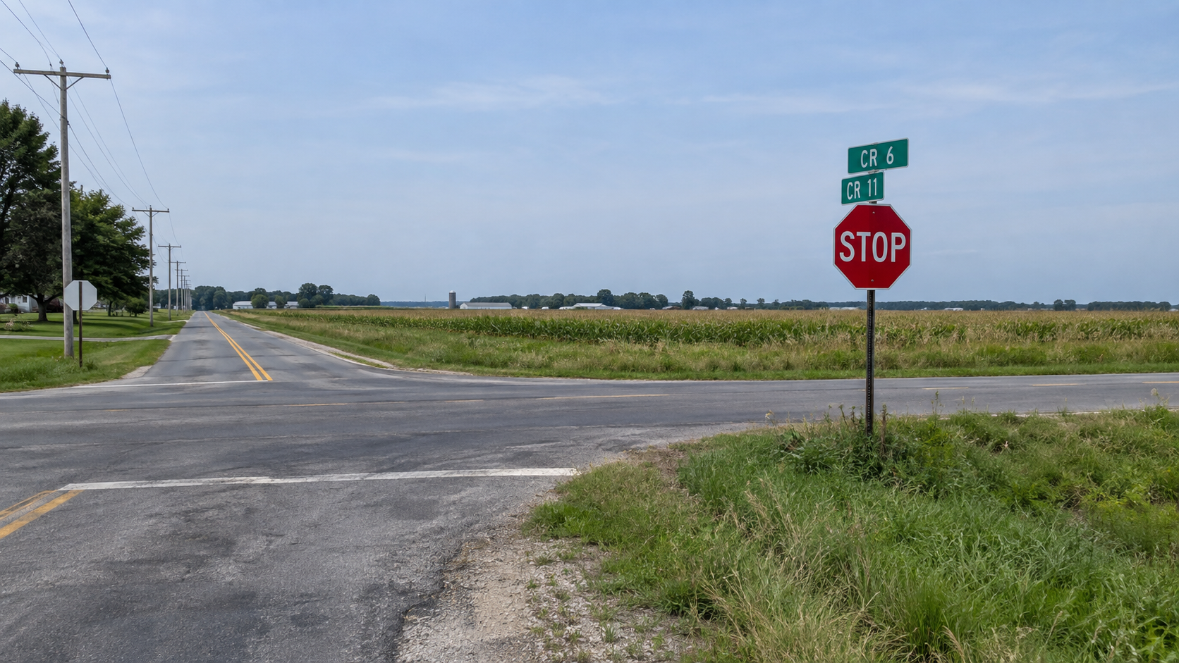 Stop-controlled county-road intersection in Elkhart County, illustrating the setting of a reported failure-to-yield crash.