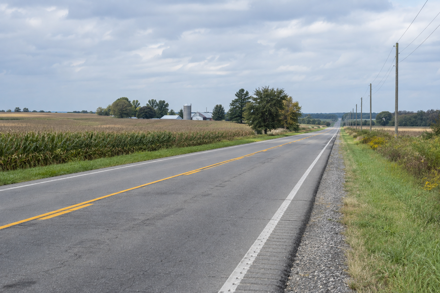 Centerline markings on a two-lane Indiana highway, illustrating the lane separation involved in the Daviess County head-on crash report.