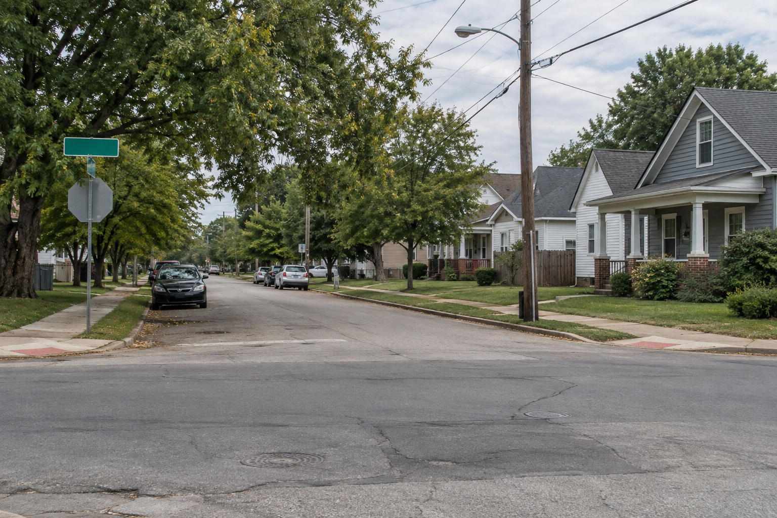 Indianapolis residential intersection representing the Guilford Avenue area where one man was killed and another was wounded.