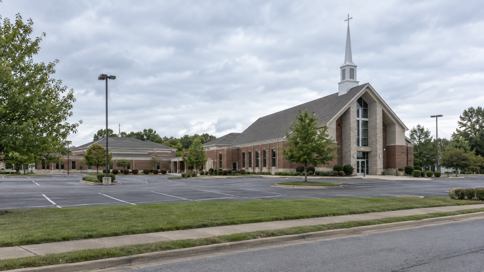Church exterior and parking area in Evansville, where police reportedly found an injured Lyft driver.