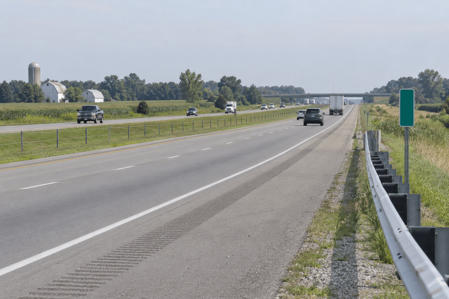 Divided lanes and a grass median along Interstate 64 in Gibson County, where investigators reviewed a fatal head-on crash.