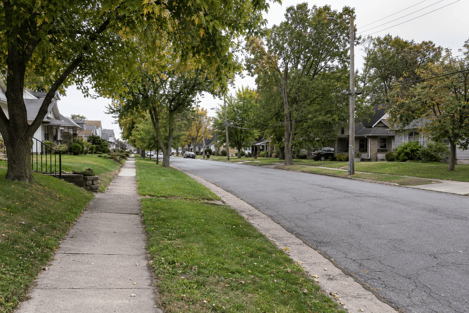 Residential roadway and sidewalk in Indianapolis, relevant to the reported pedestrian collision on Eagle Pointe Drive North.