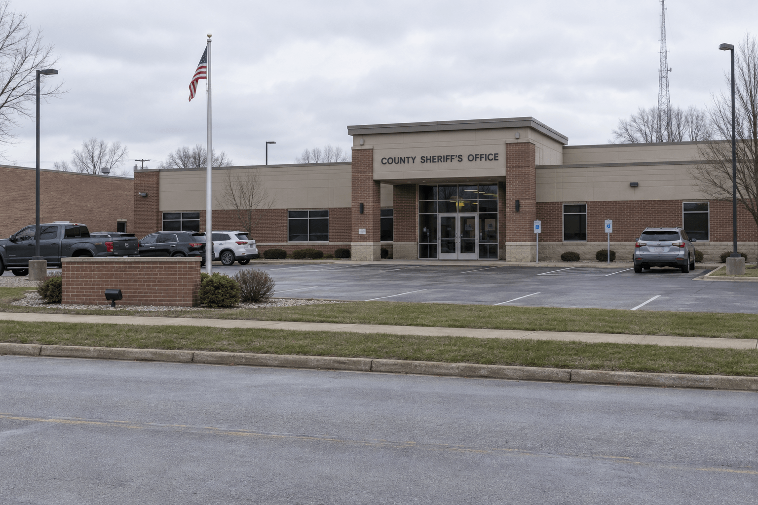 A county sheriff's office exterior representing the DeKalb County crash report and ongoing investigation process.