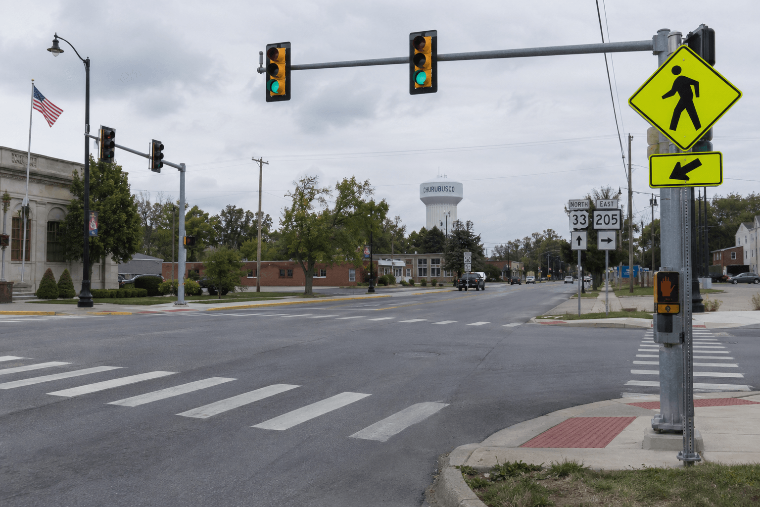 Pedestrian crossing area at a state highway intersection in Churubusco, Indiana, providing context for the reported US 33 crash.