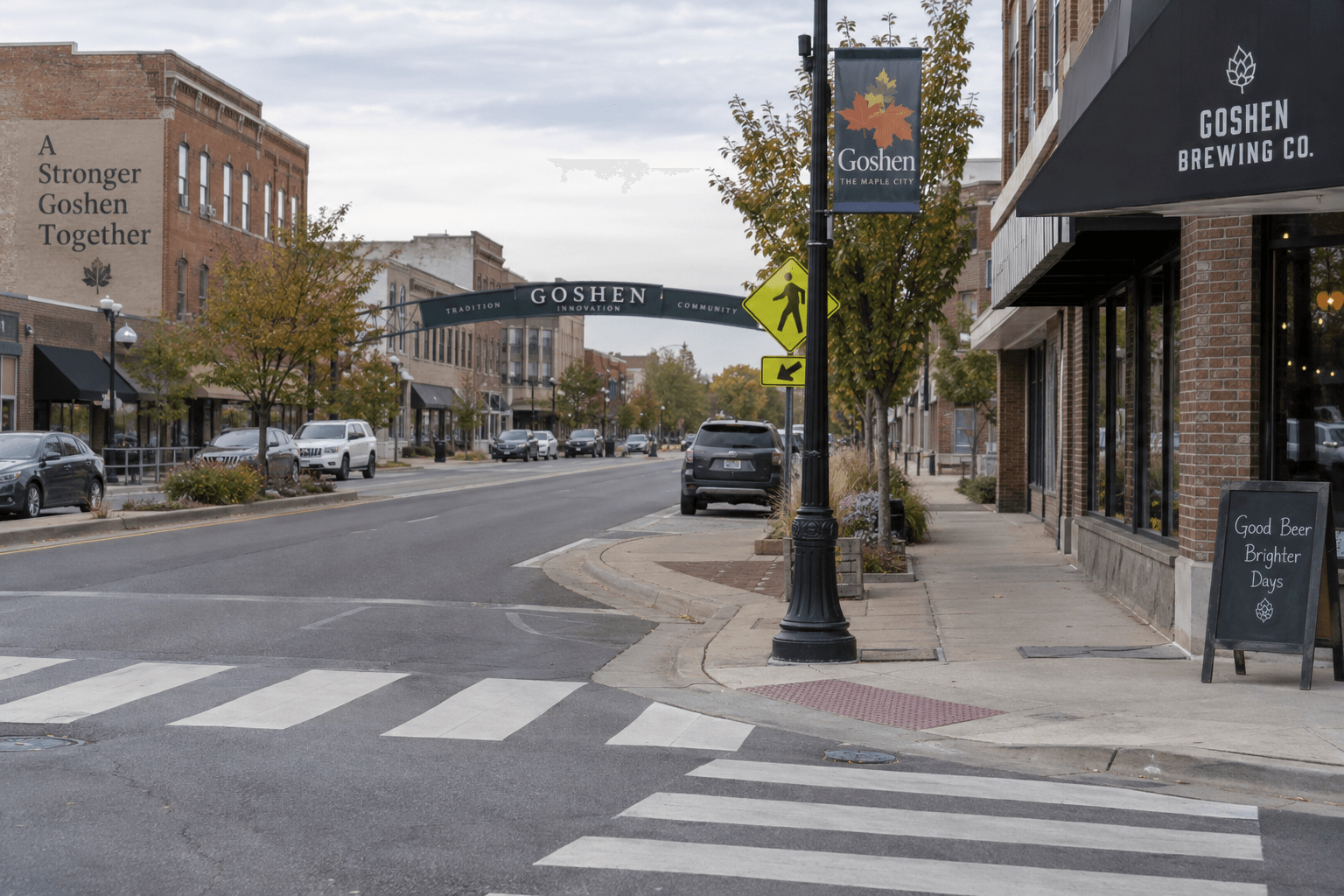 Crosswalk and sidewalk in Goshen, Indiana, providing context for the reported bicycle collision near South Main Street.