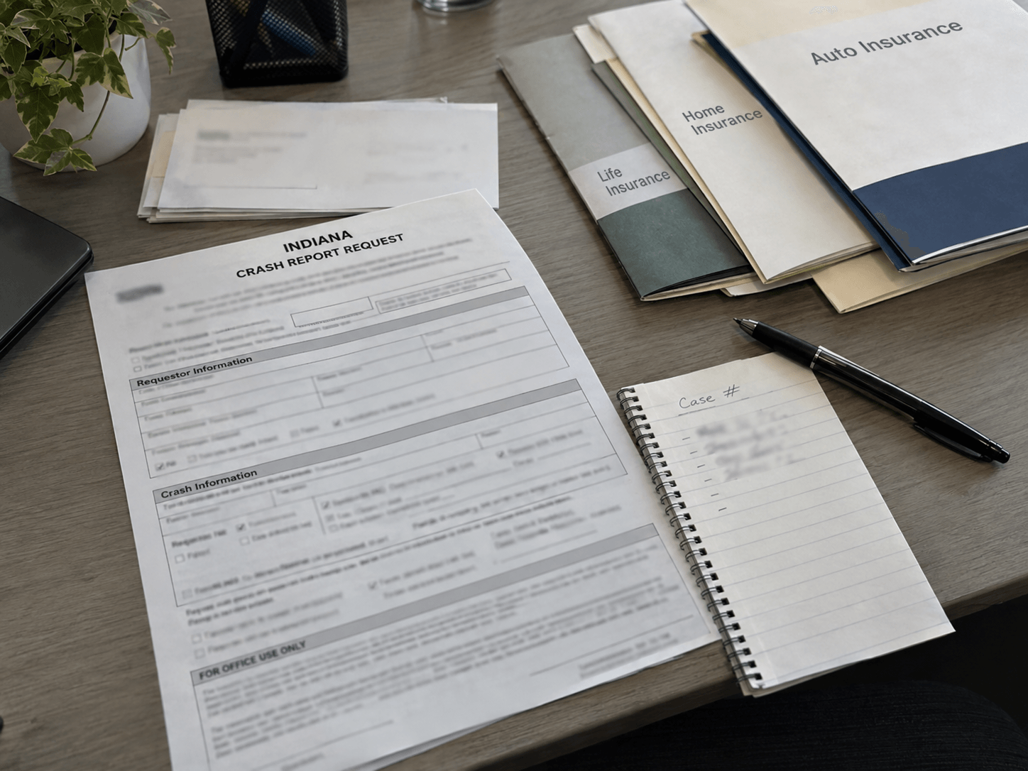 Crash-report and insurance documents illustrating evidence and coverage issues after a Grant County motorcycle crash.