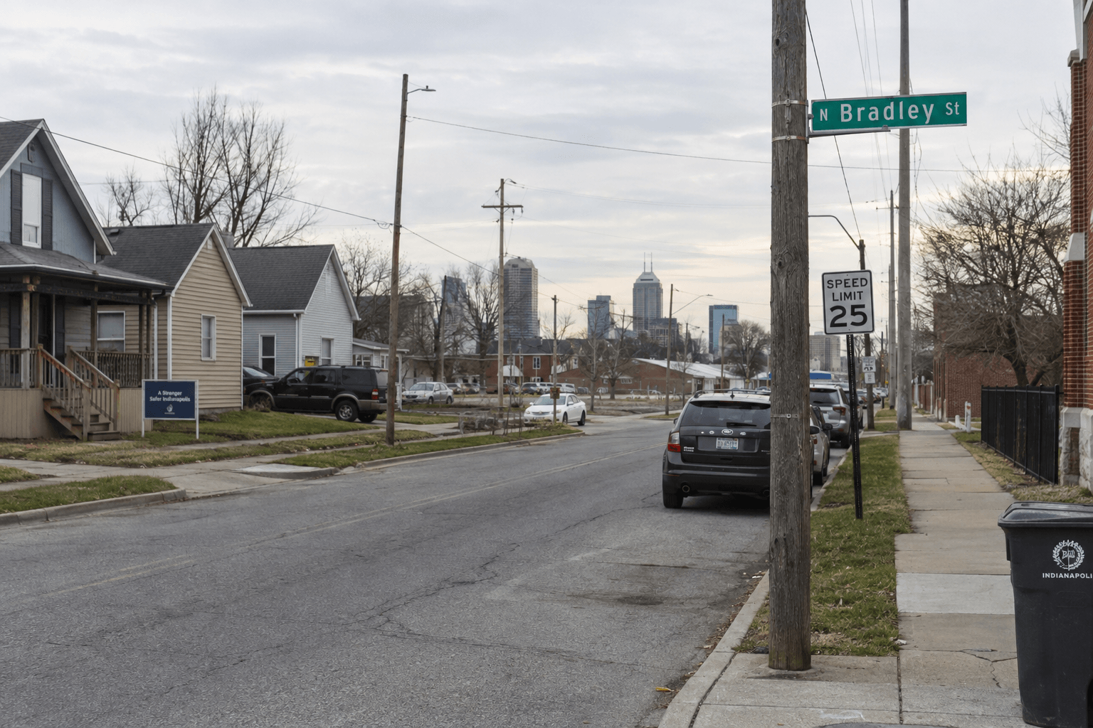 North Bradley Street sign and surrounding Indianapolis streetscape near the reported shooting location.