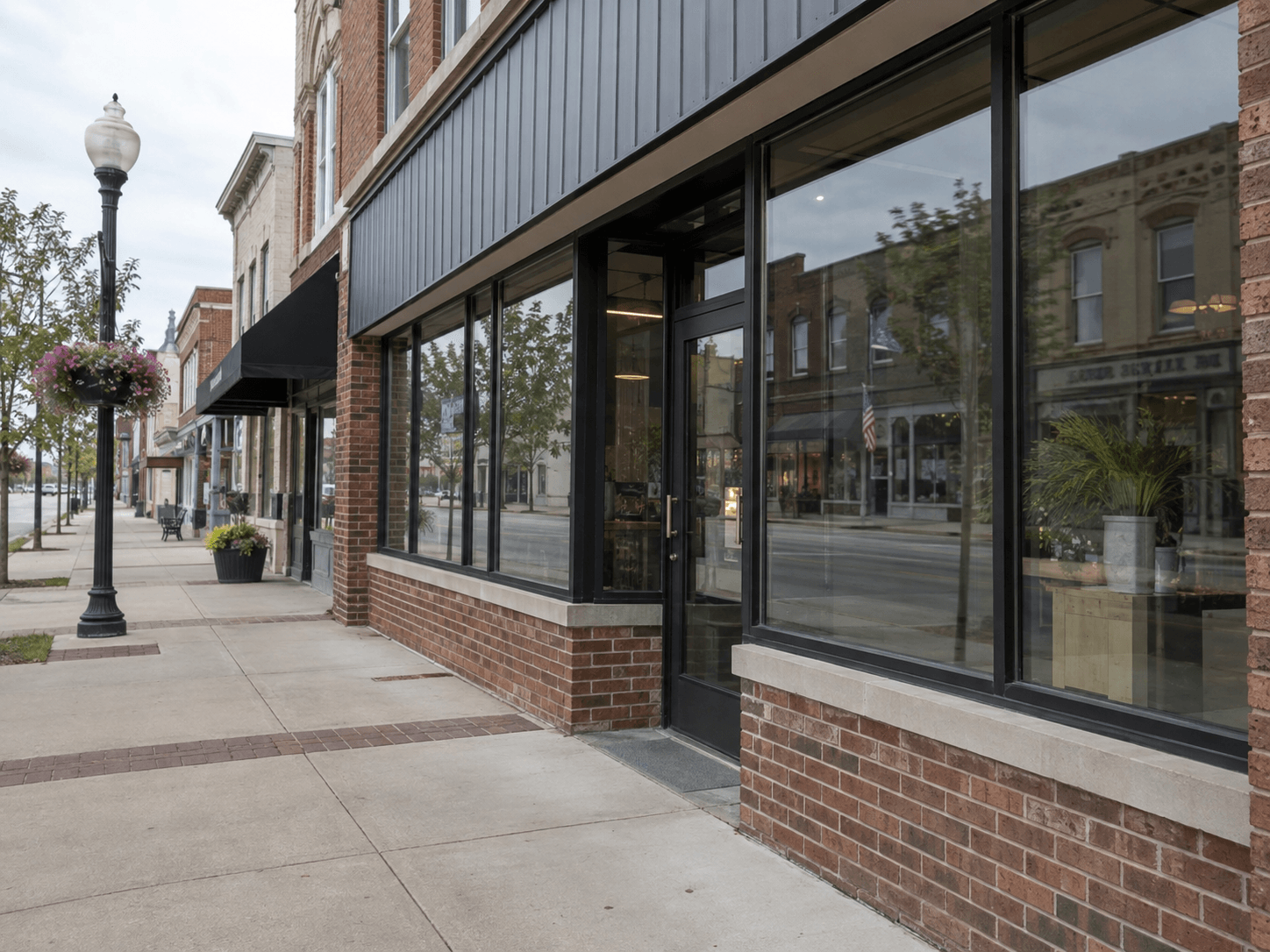 Glass-front commercial building in Boonville illustrating the type of property involved in the Highway 62 crash.
