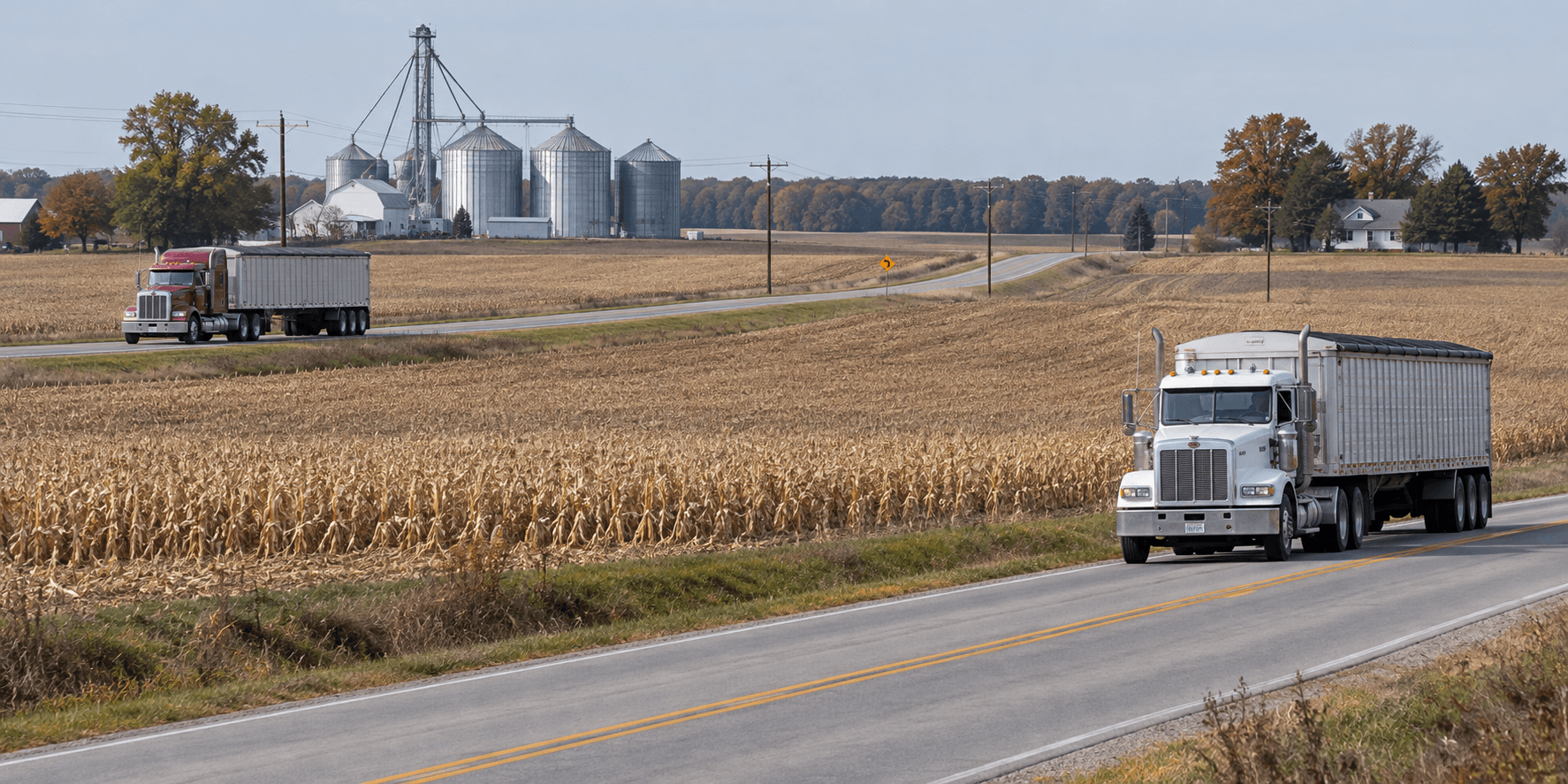 Grain semis traveling on rural Indiana roads, illustrating commercial truck traffic during harvest season in Pulaski County.