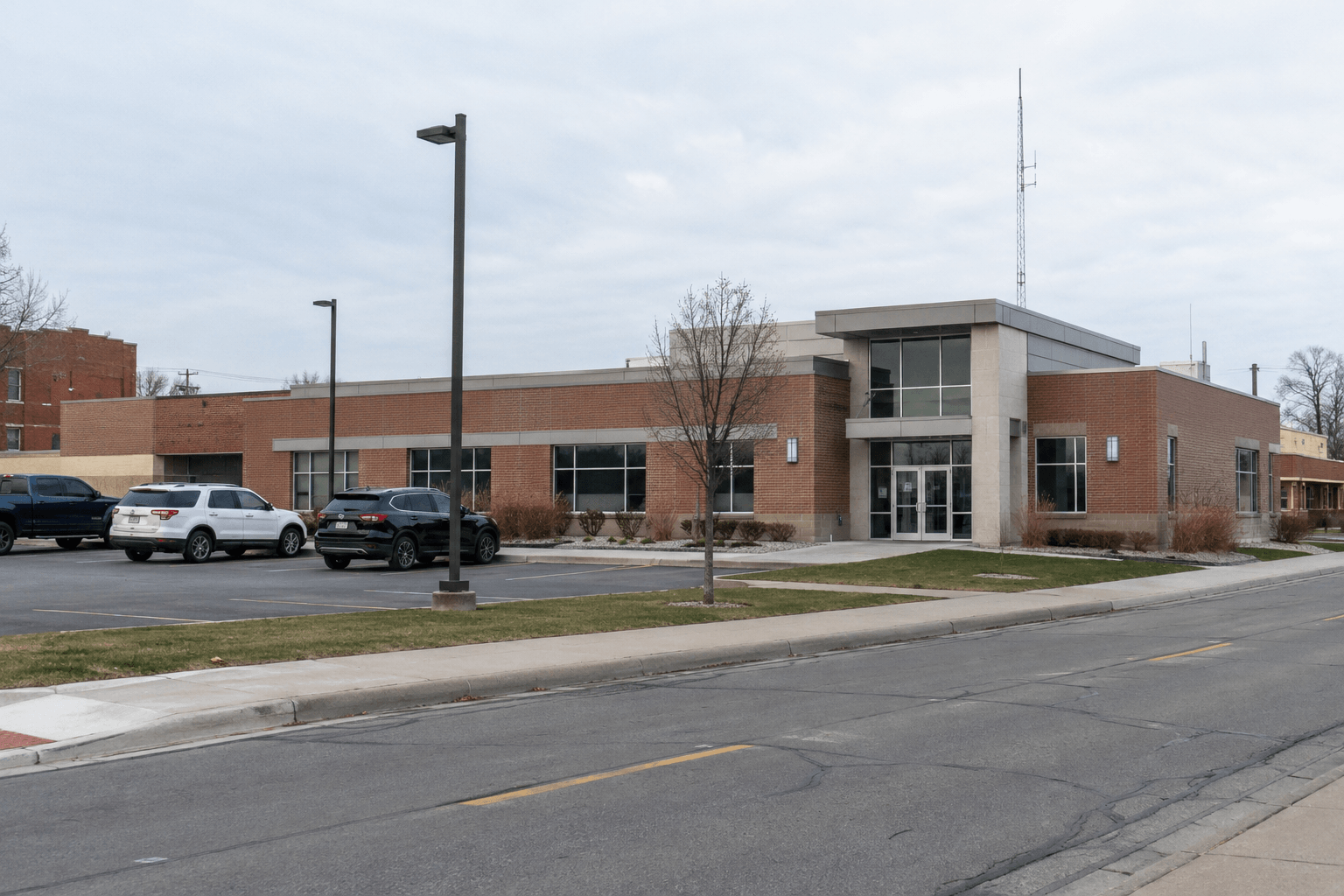 Indiana municipal police station exterior representing the ongoing investigation and crash-report process after a Warsaw motorcycle collision.